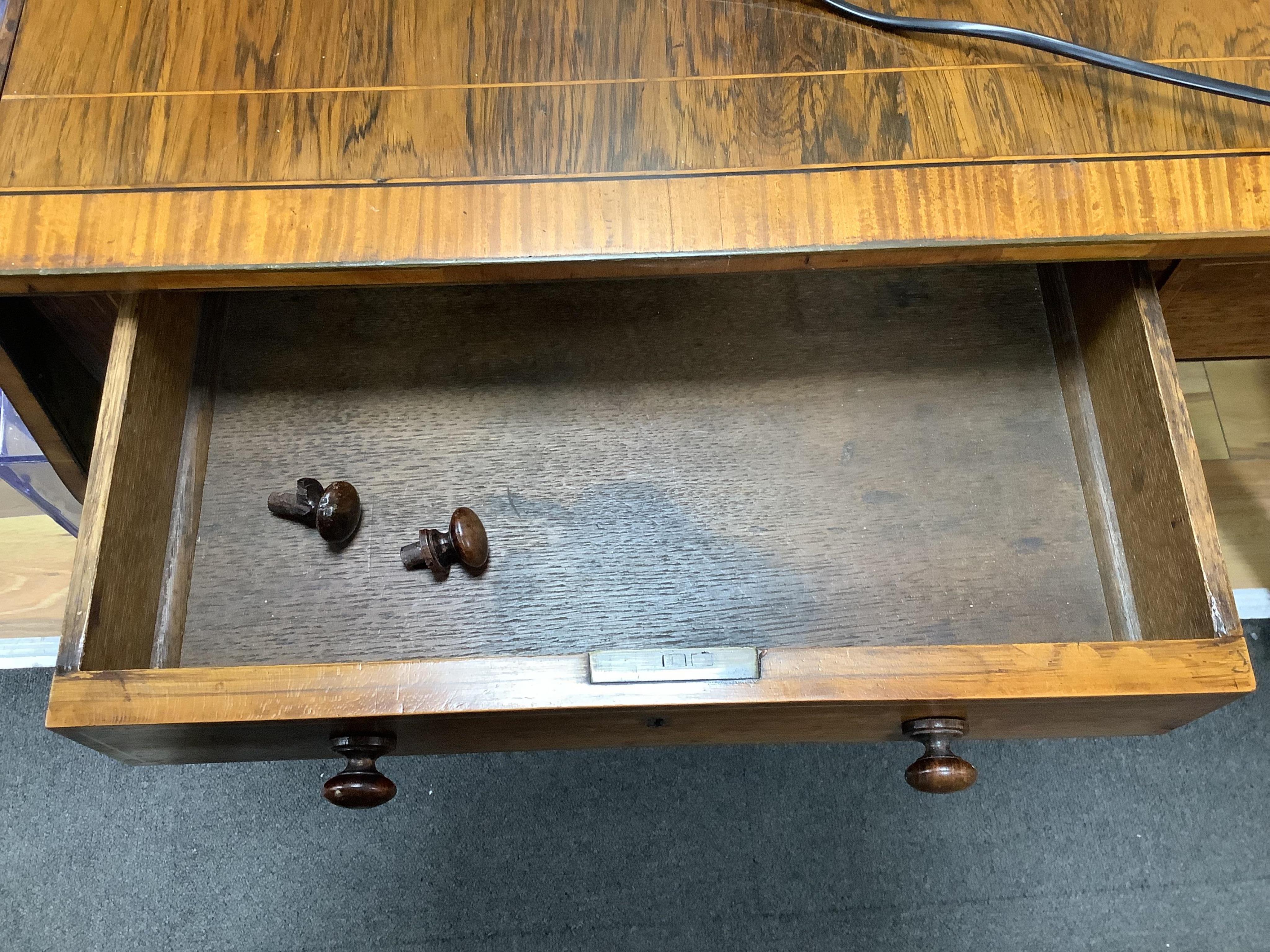 A Regency satinwood banded rosewood sofa table, width 92cm, depth 66cm, height 71cm. Condition - fair